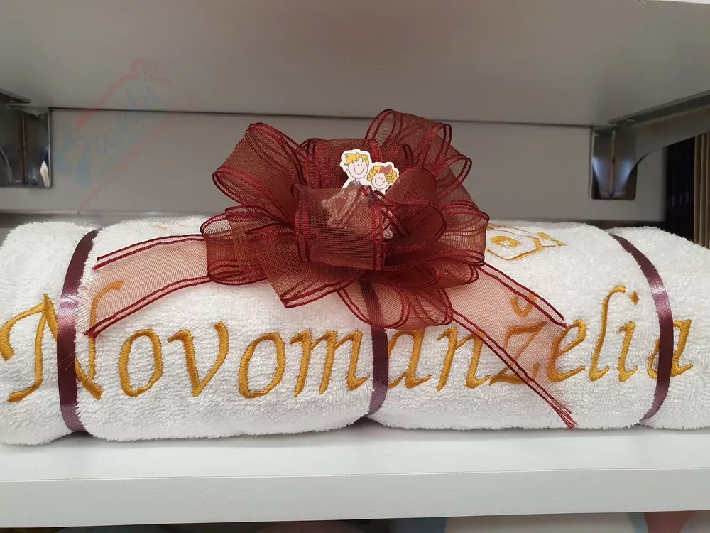 Osuška s nápisom NOVOMANŽELIA