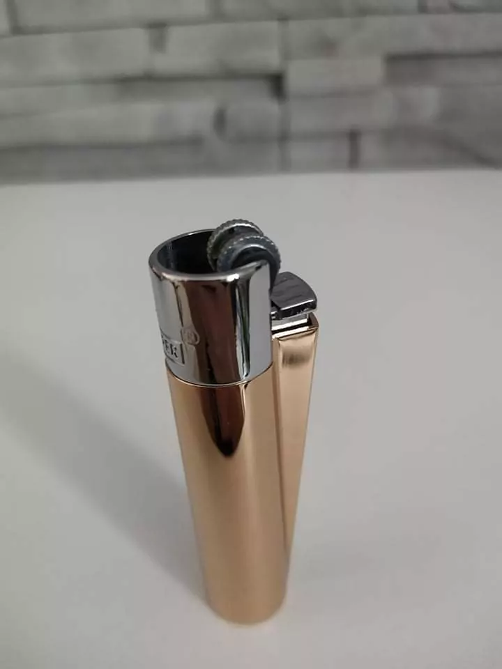 Kovový zapaľovač CLIPPER zlato-strieborný