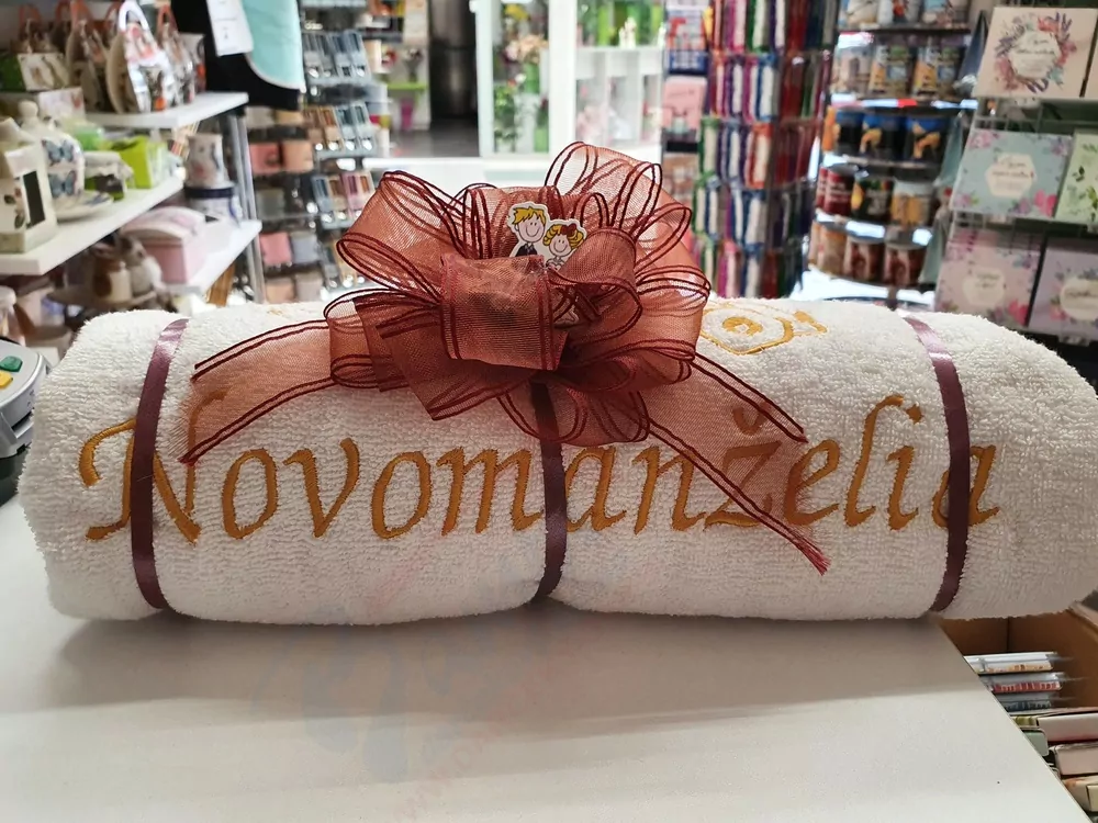 Osuška s nápisom NOVOMANŽELIA