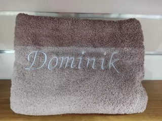 Osuška s menom Dominik