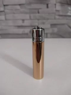 Kovový zapaľovač CLIPPER zlato-strieborný