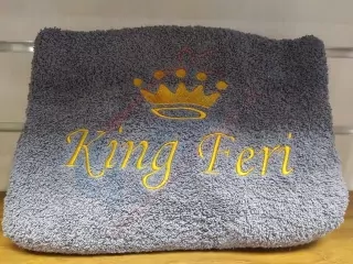 Osuška s nápisom King Feri