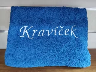 Osuška s nápisom Kravíček