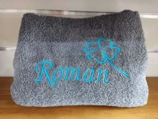 Osuška s menom Roman